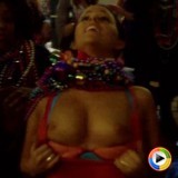 Hot girl flashes her perky tits at Mardi Gras