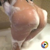 Busty Southern Brooke shows off her tight round ass in a bubble bath